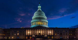Nighttime image of US Capitol Building.